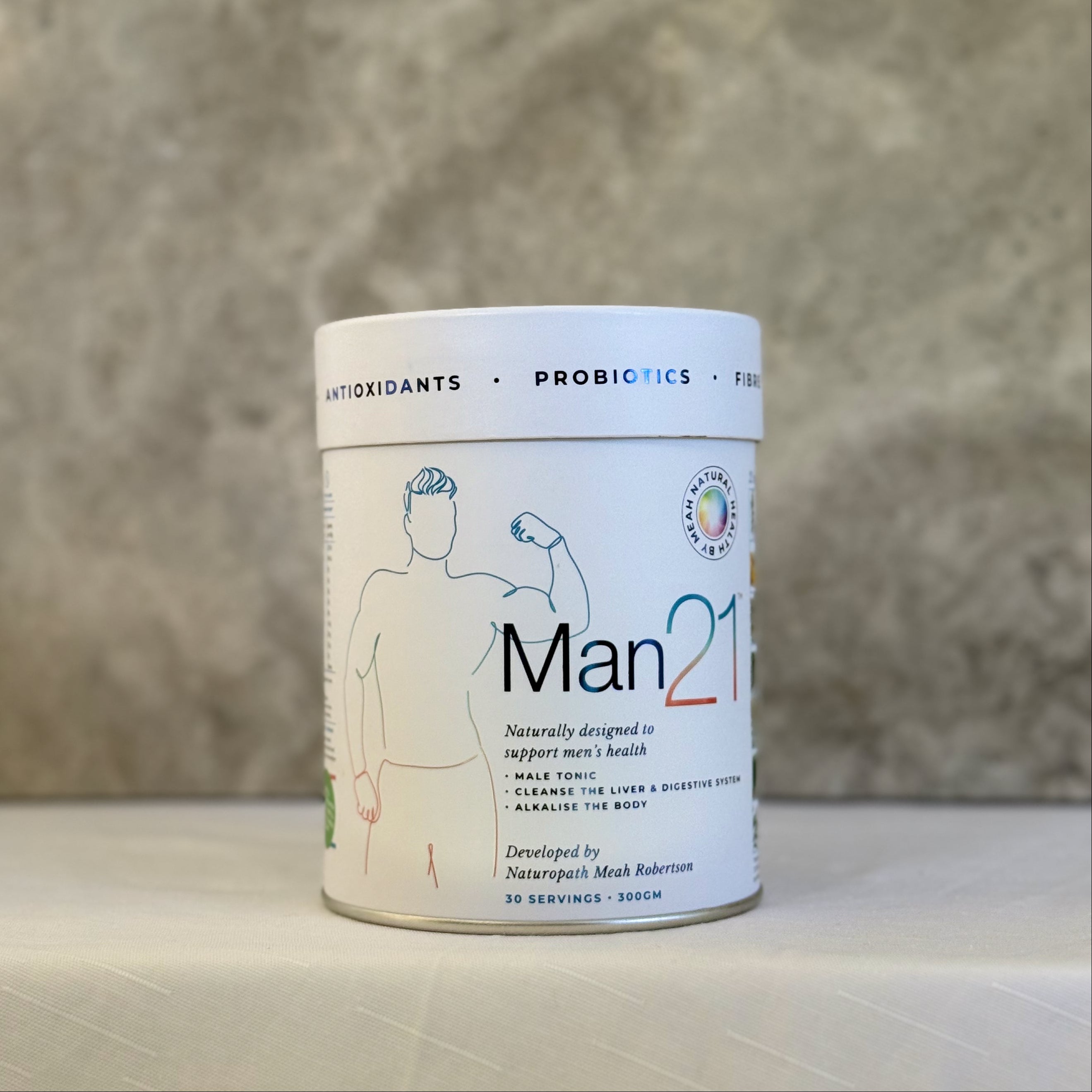 Man21 supplement container on a neutral background